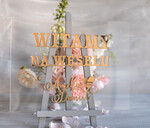 Plany stołów na pleksie - akryl Powitanie gości na weselu przezroczysta tablica złote lustrzane napisy  Witamy na weselu tablica z powitaniem gości weselnych Pleksa0