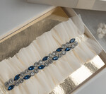 Panna Młoda  podwiązki ślubne podwiązka ślubna tiulowa, podwiązka ślubna dla Panny Młodej z niebieskimi ozdobnymi kamieniami, podwiązka dla Panny Młodej z tiulu z ozdobnymi kamieniami2